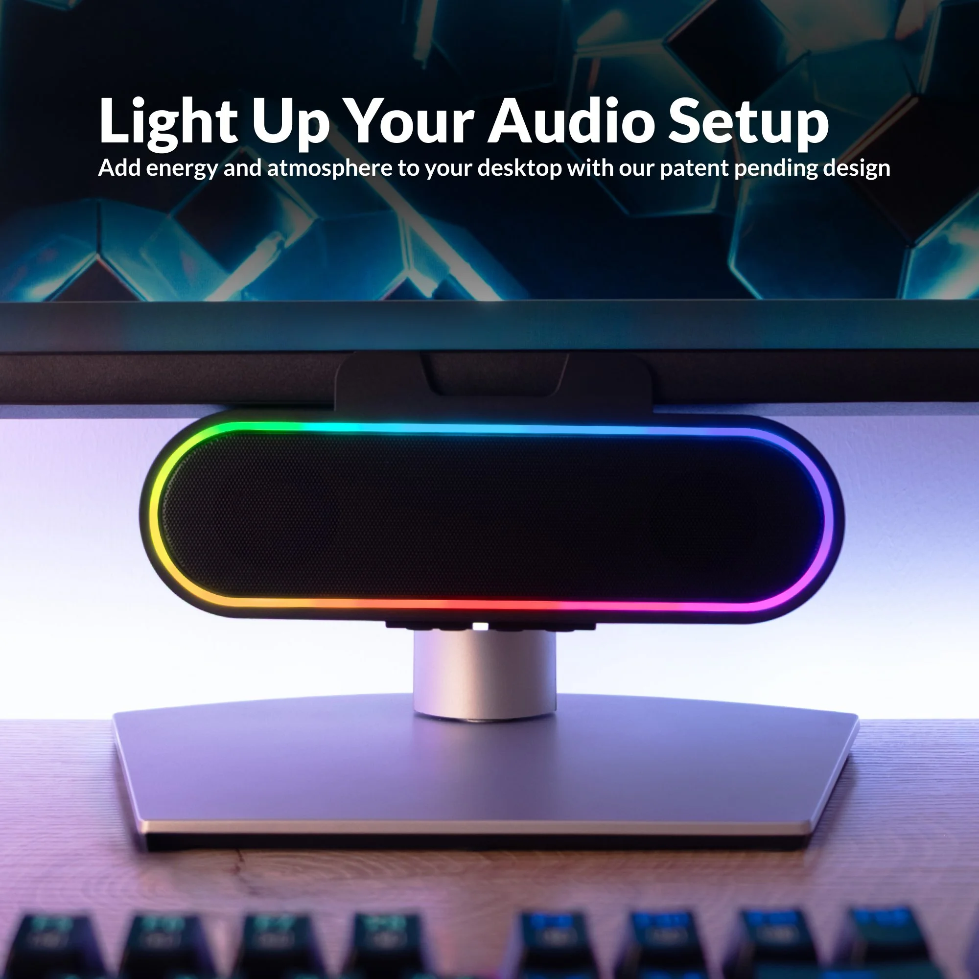 CA-2890GX RGB speakerbar mounted under a monitor lighting up a desktop setup