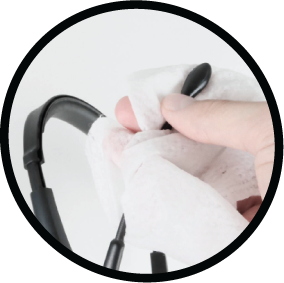 Hand wiping the microphone boom arm and housing of a call center headset with an alcohol wipe