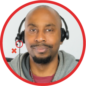 Man wearing call center headset with boom mic pointing straight out to the side — incorrect position, red circle border
