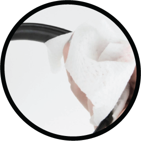 Hand wiping the underside of a call center headset headband with an alcohol wipe