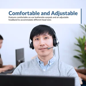 Office worker wearing AC-204 wired PC headset with boom microphone at a laptop — comfortable adjustable headband and leatherette earpads for all-day use on video calls and PC audio