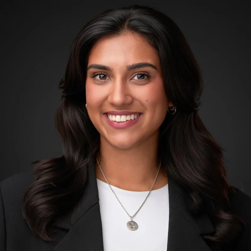 Professional headshot Winnipeg woman dark background 204 Photography