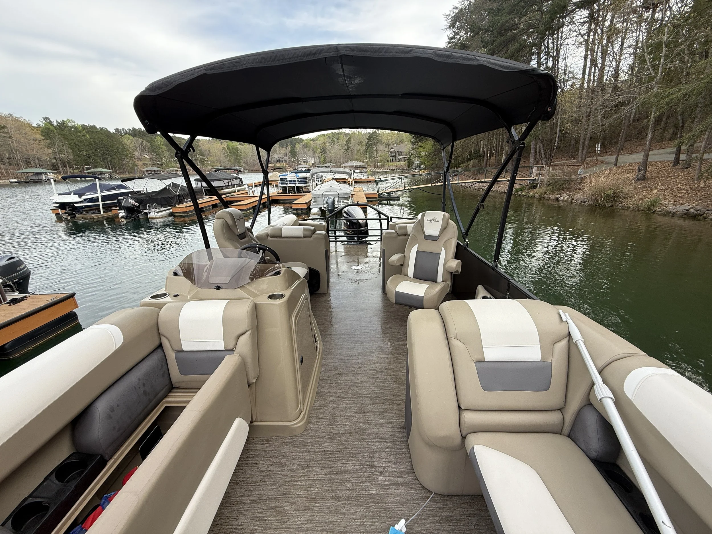 Detailed boat interior — clean vinyl, conditioned seating, streak-free consoles
