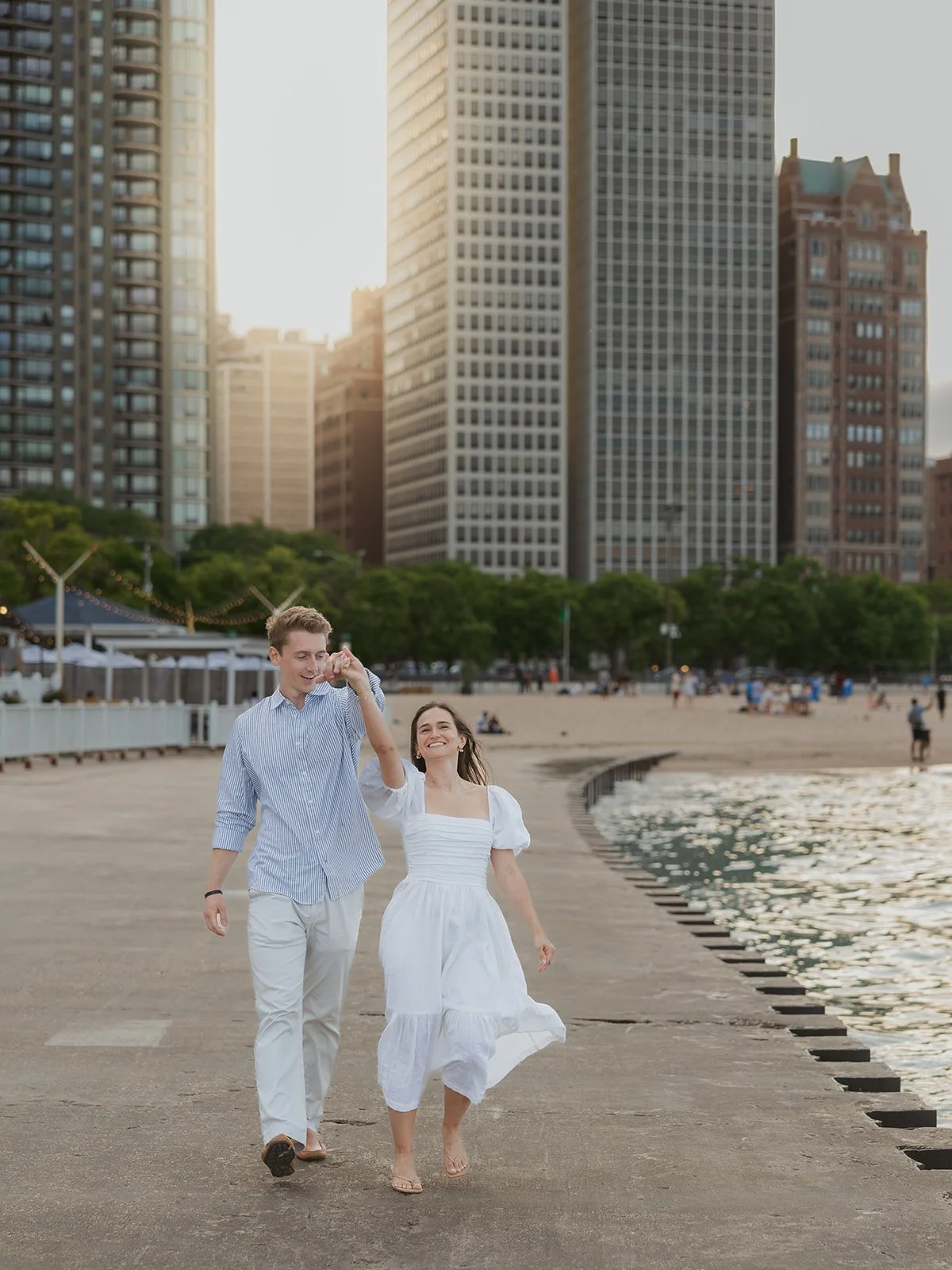 Engagement portrait at Oak Street Beach after the proposal