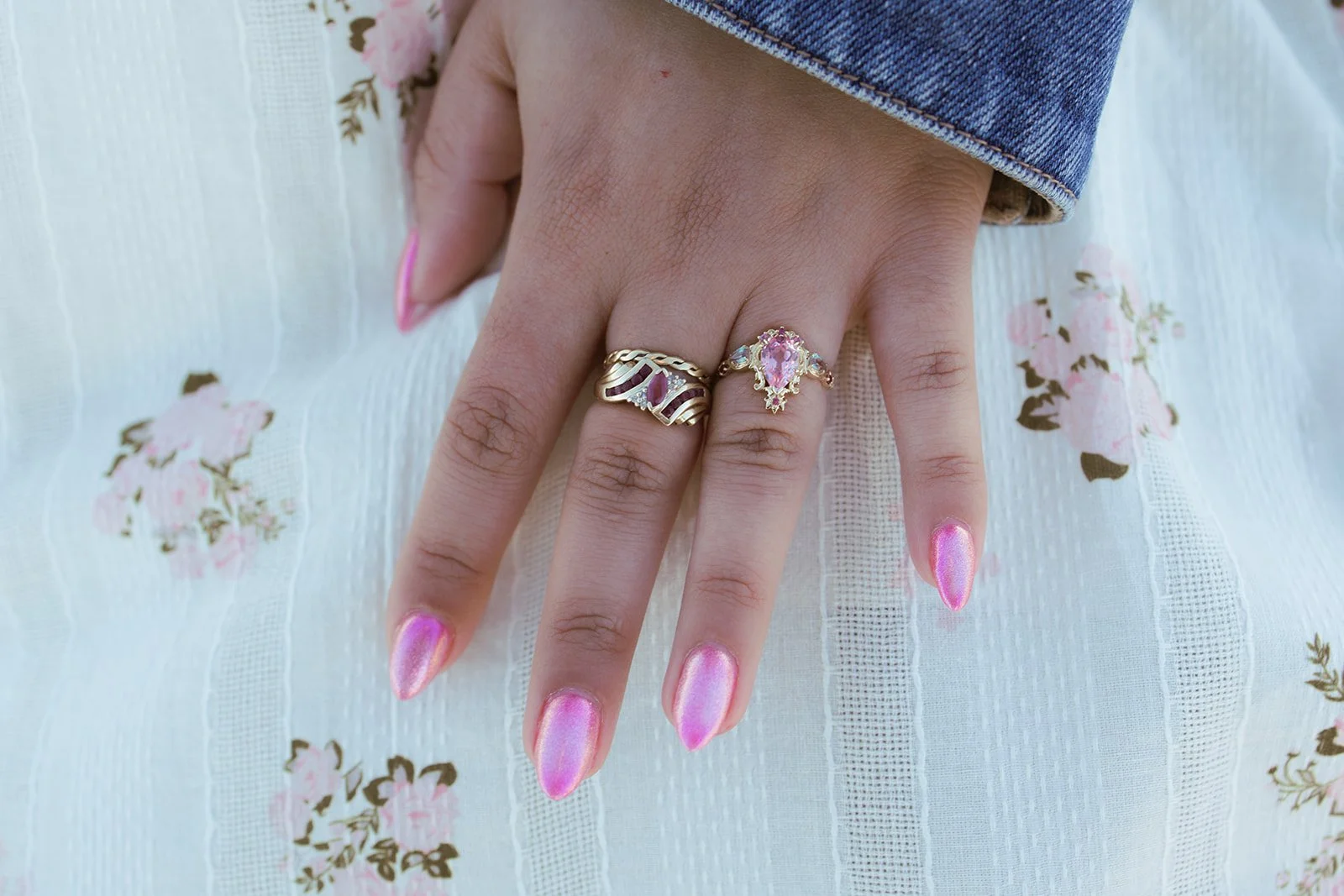 Close-up of the engagement ring Ally designed herself, on her hand after the proposal