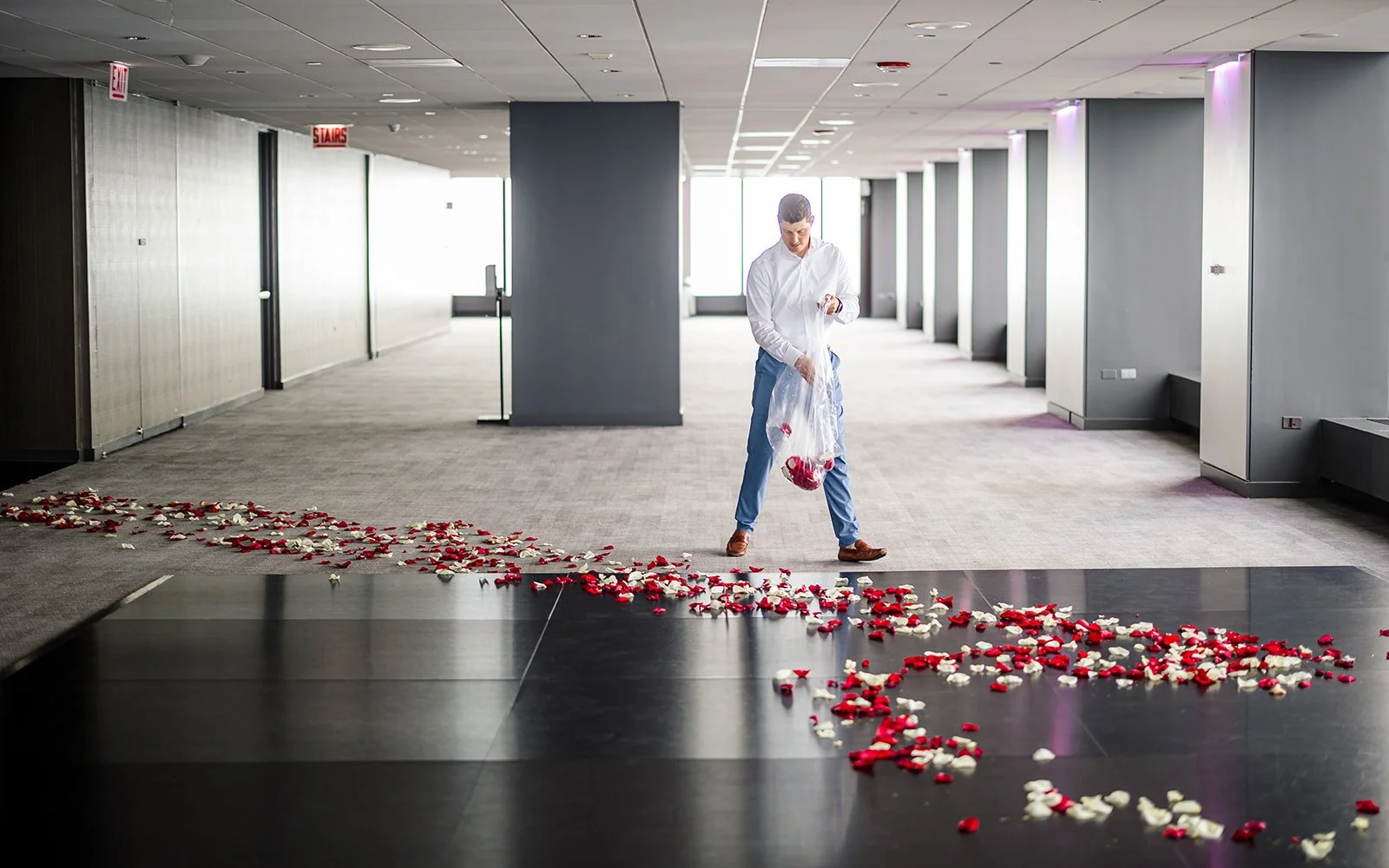 Surprise proposal moment at Willis Tower 99th floor - genuine reaction captured