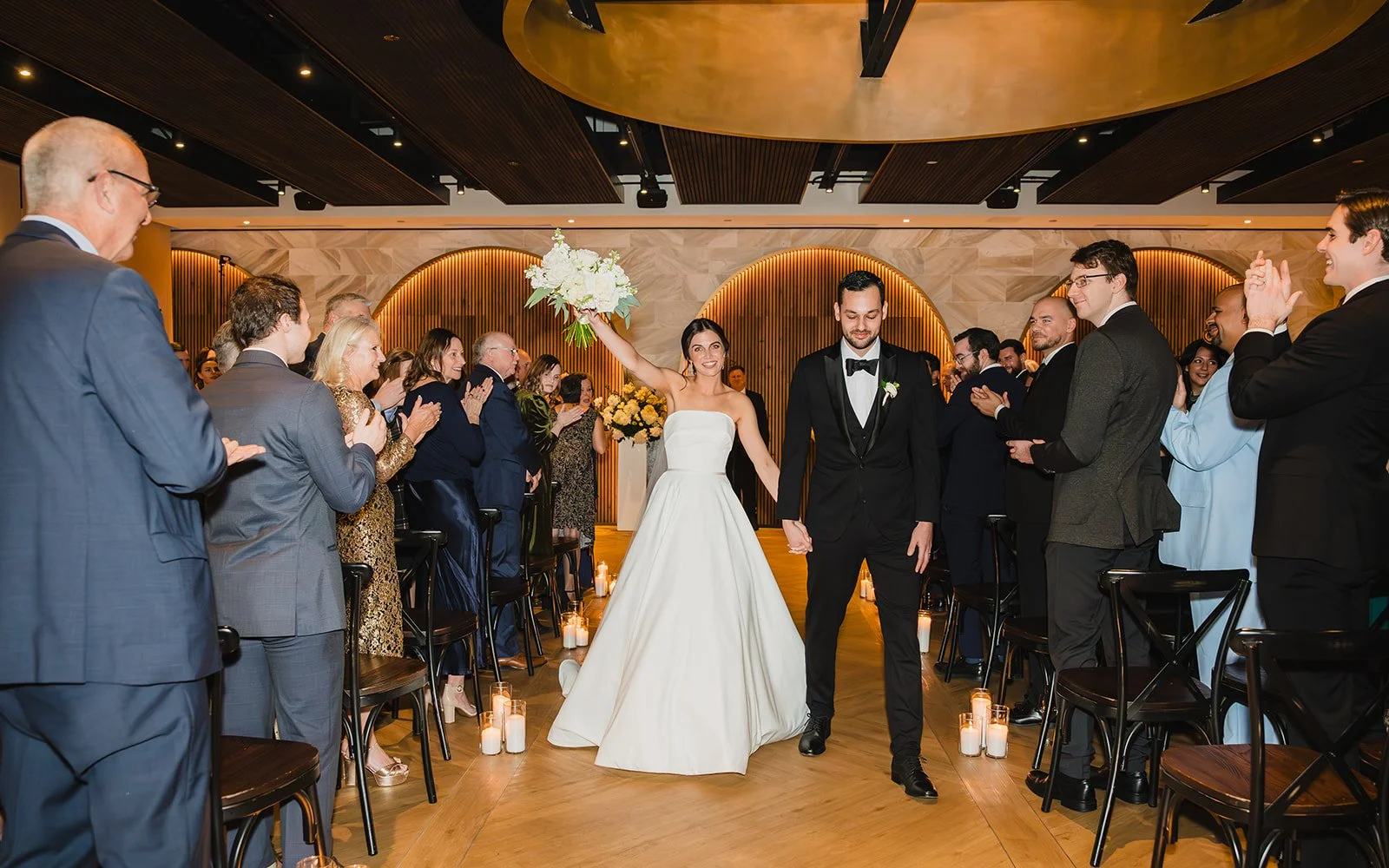 Recessional with bouquet aloft