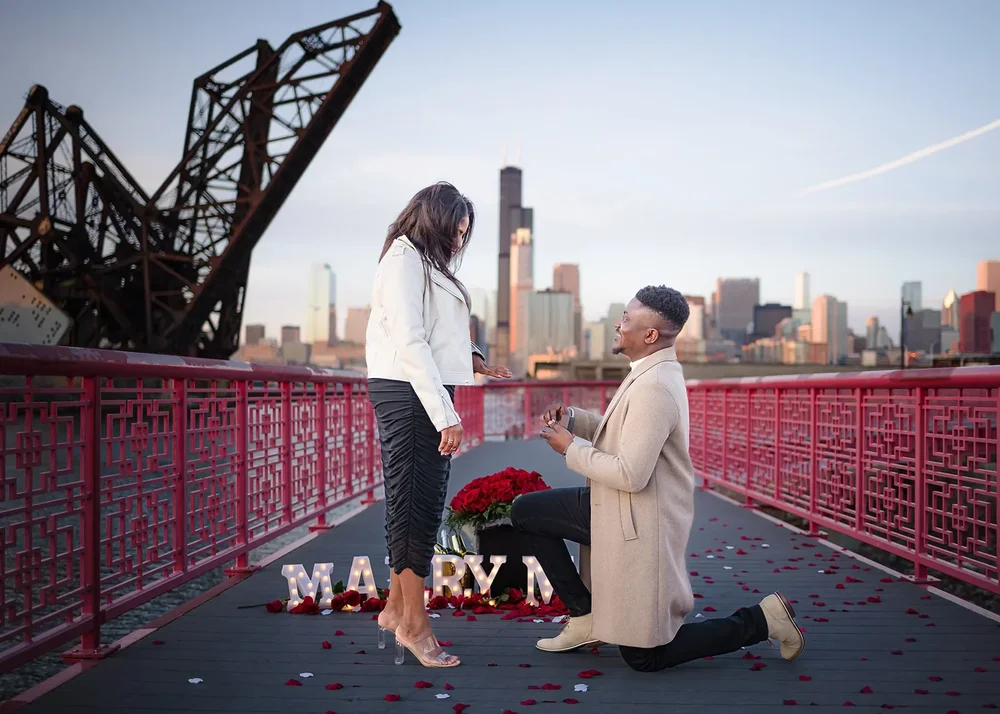 Romantic proposal with city skyline background