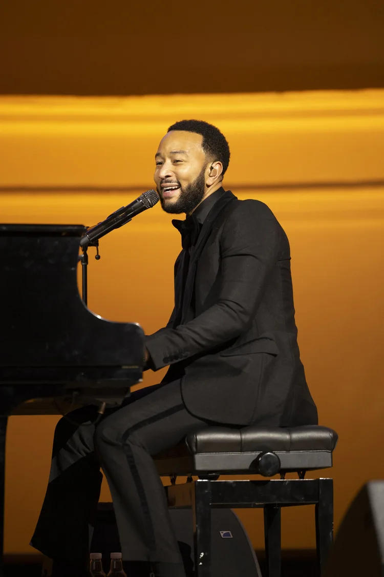 Anniversary gala celebration — Chicago ballroom with stage lighting and crowd