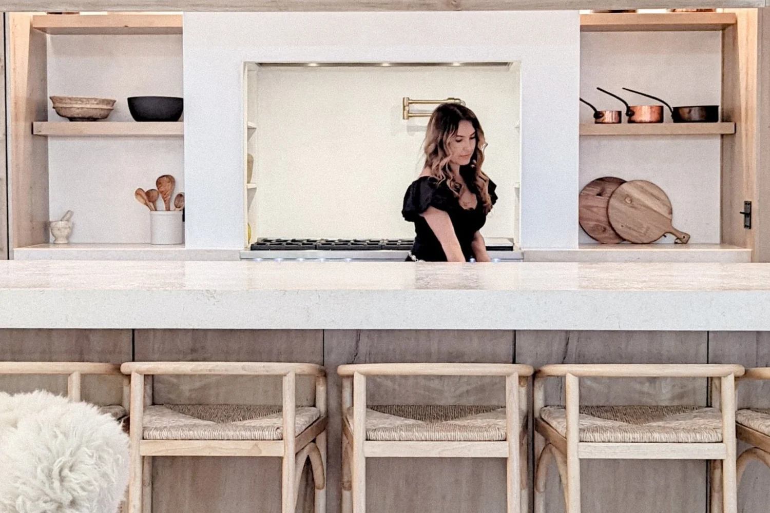 Shirley Slee in a warm, neutral kitchen, photographed by Lovelle Media