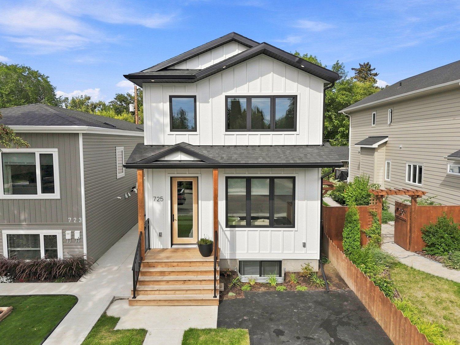 Front exterior of a white two-storey home