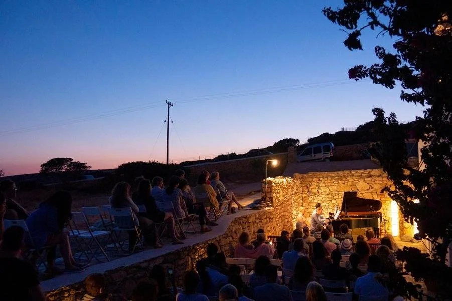 Koufonisia Classical Music Festival venue at dusk, in the 2020 festival announcement.