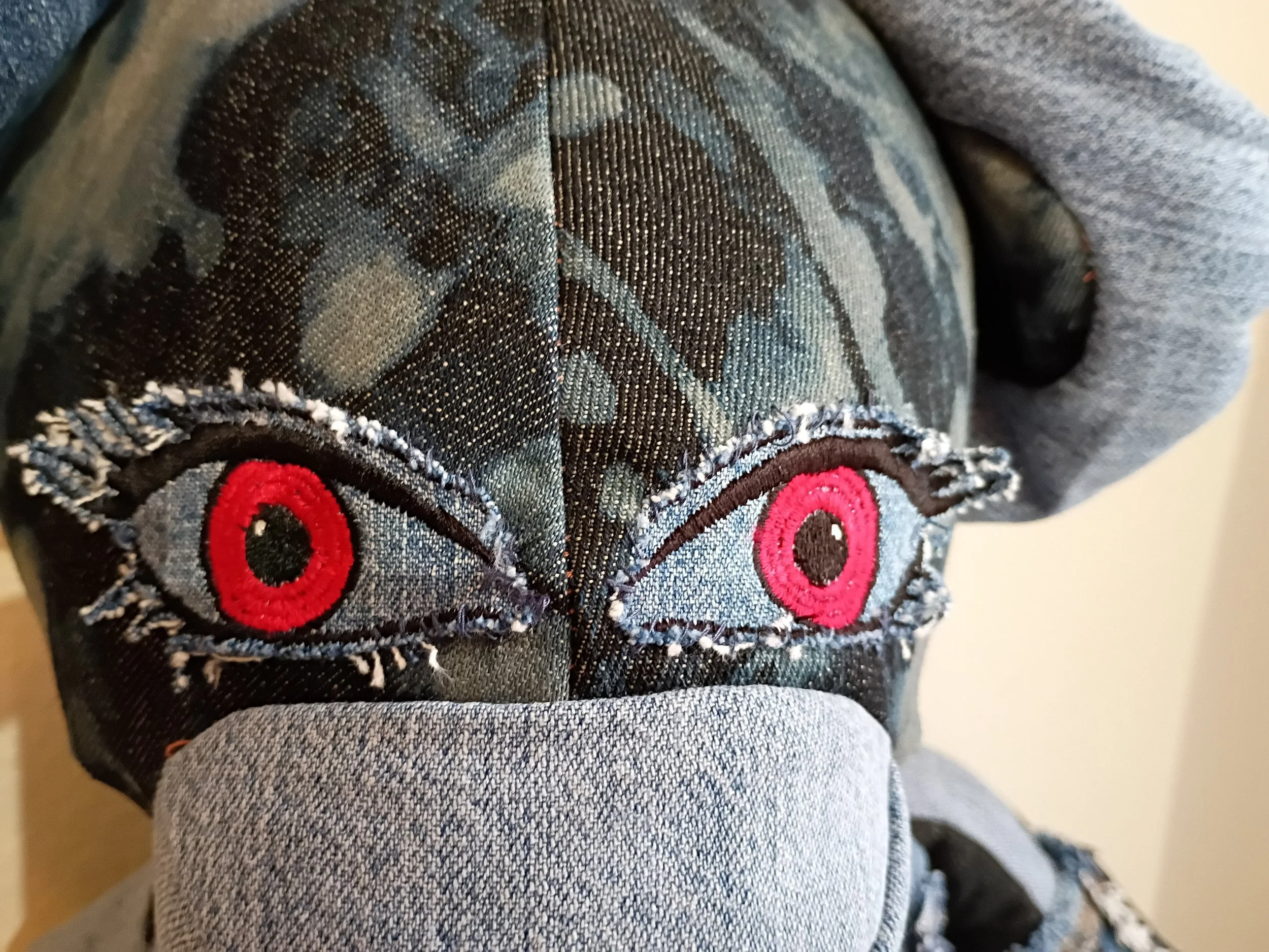 Zipporah's red eyes — a close-up detail
