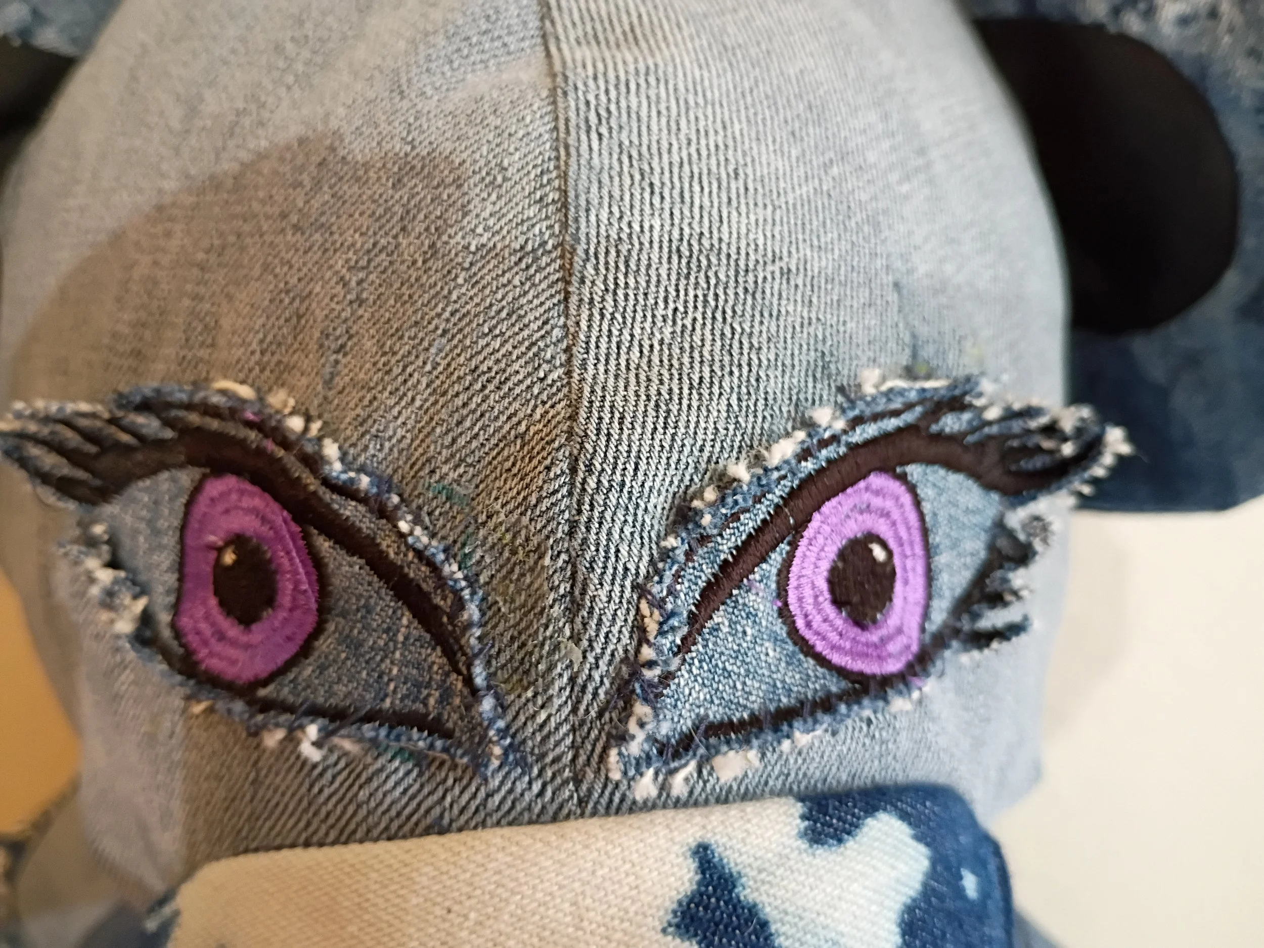 Aurelia's captivating purple eyes — a close-up detail