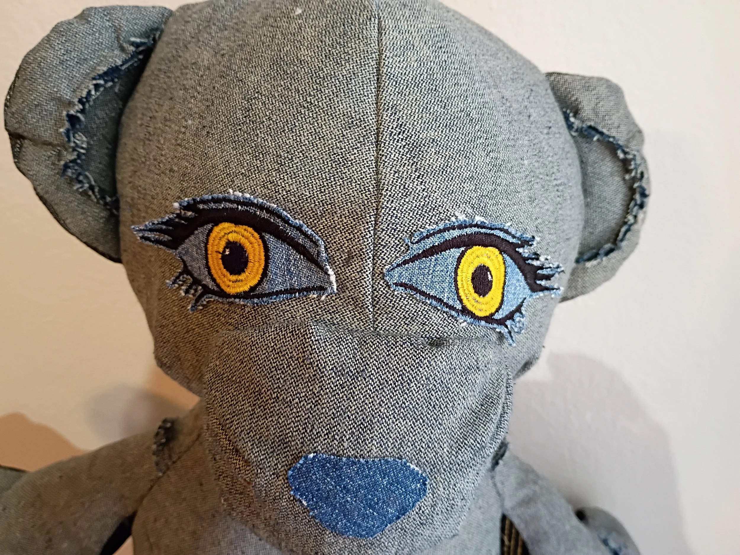 Selah's warm golden eyes — a close-up detail