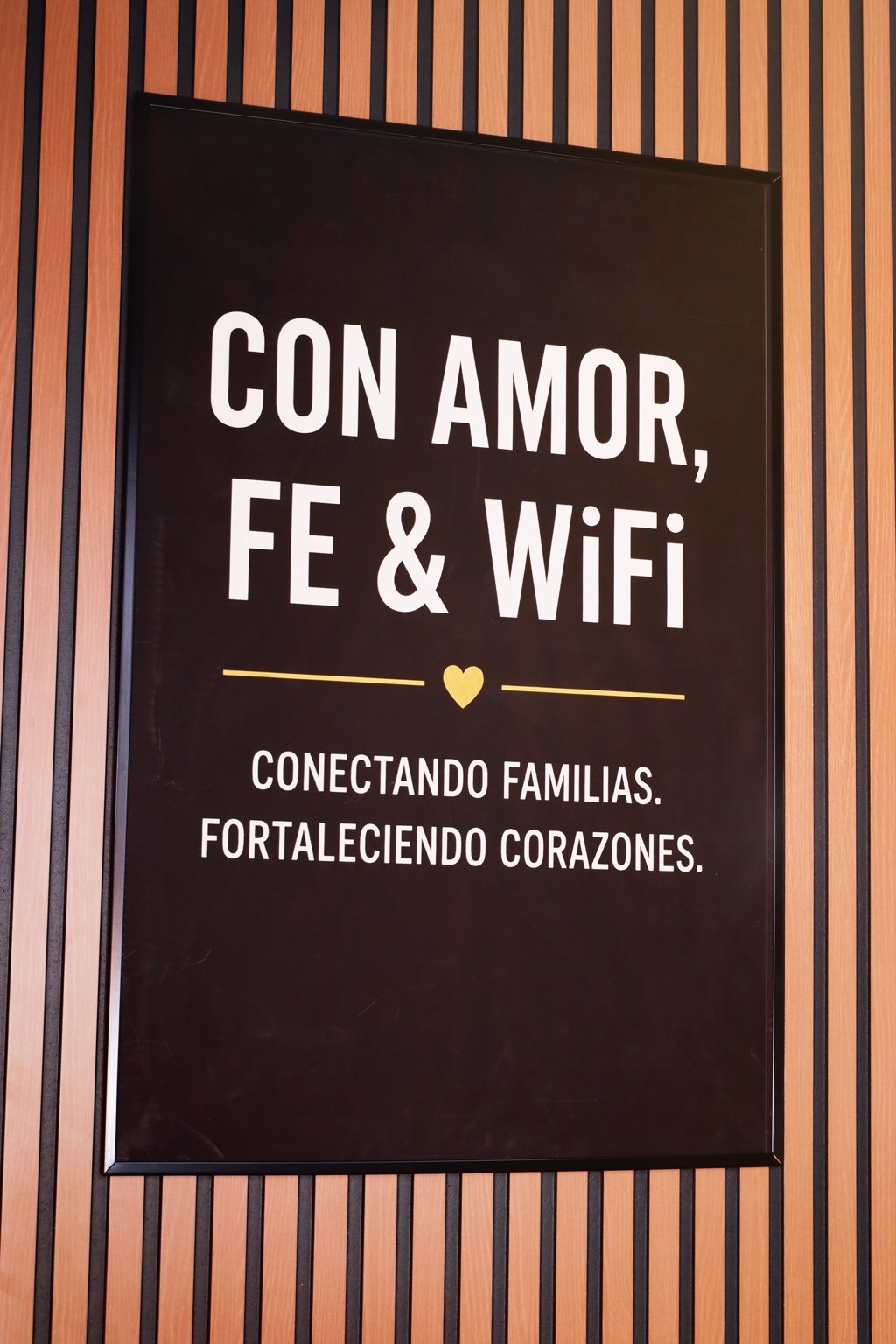 Con Amor, Fe and WiFi studio sign