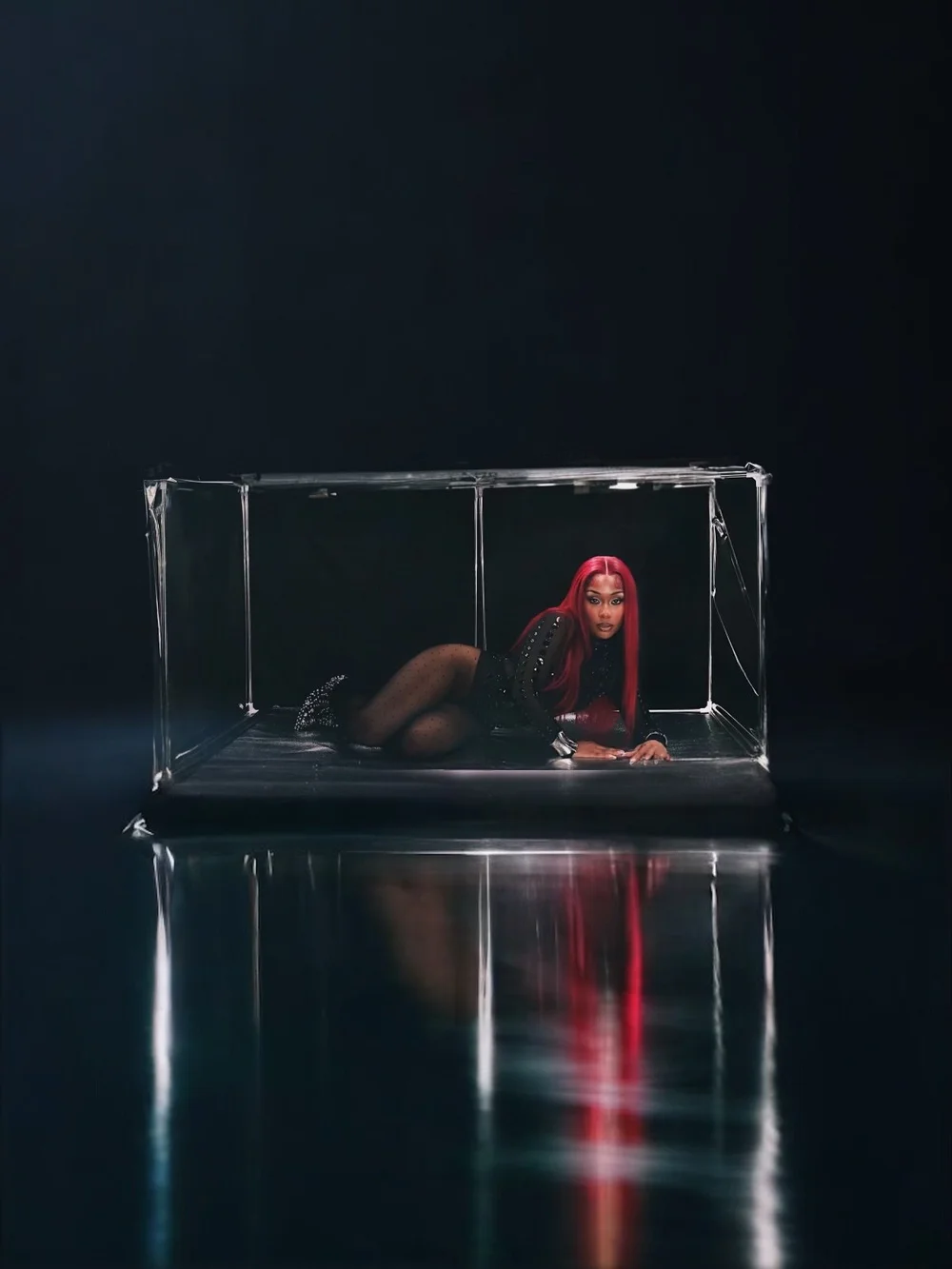 Conceptual portrait with reflective staging