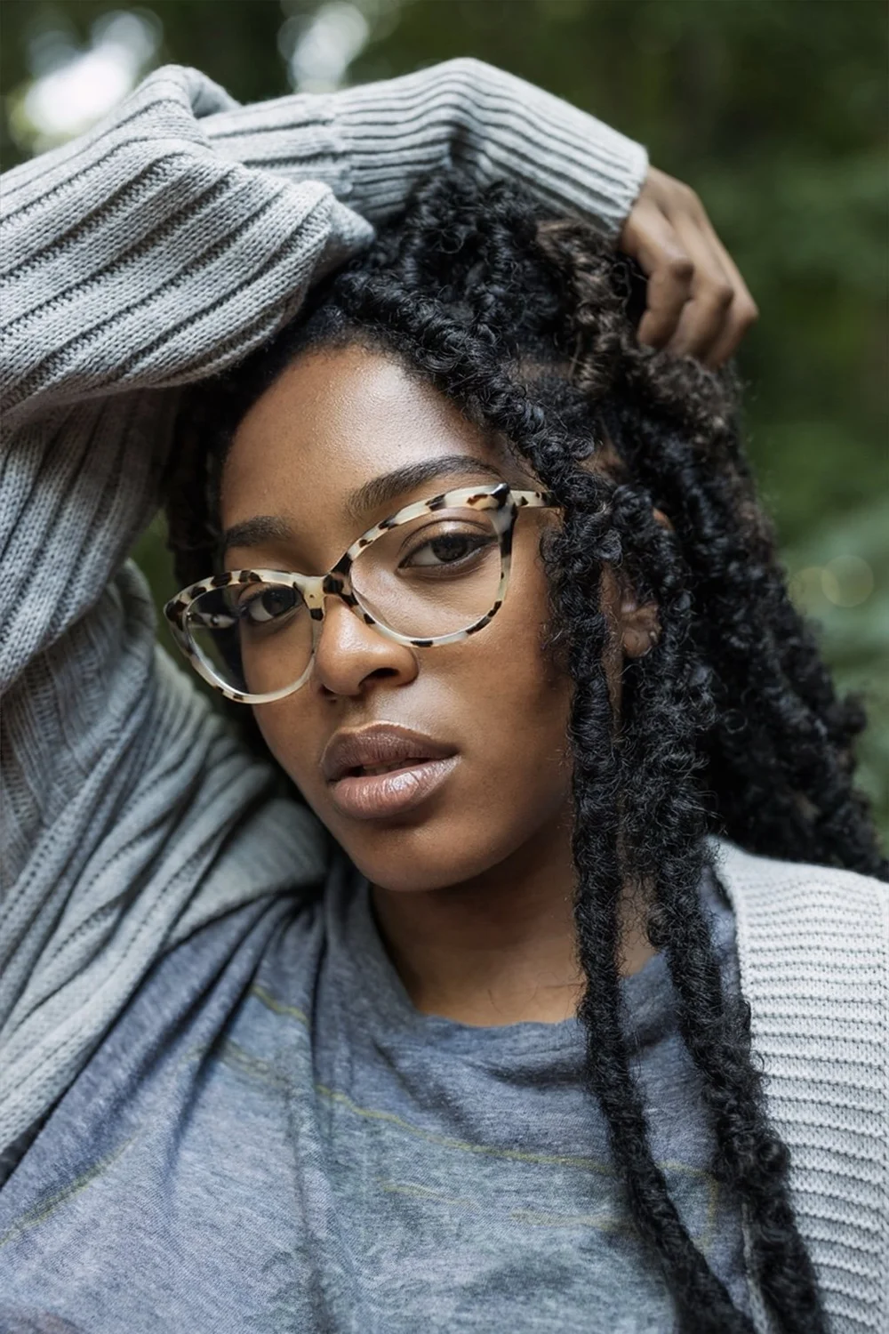 Portrait with glasses and layered fabric styling