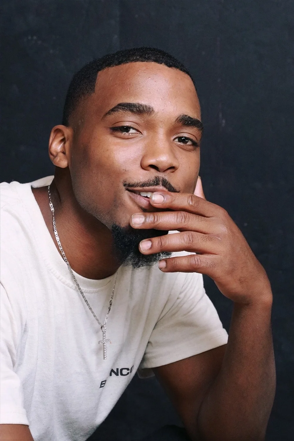 Studio portrait in a white shirt