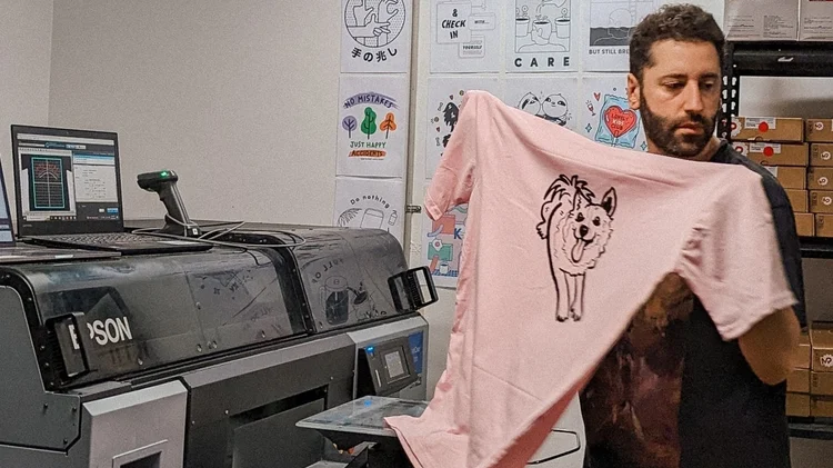 Printing a custom t-shirt at Louie's studio in Artarmon