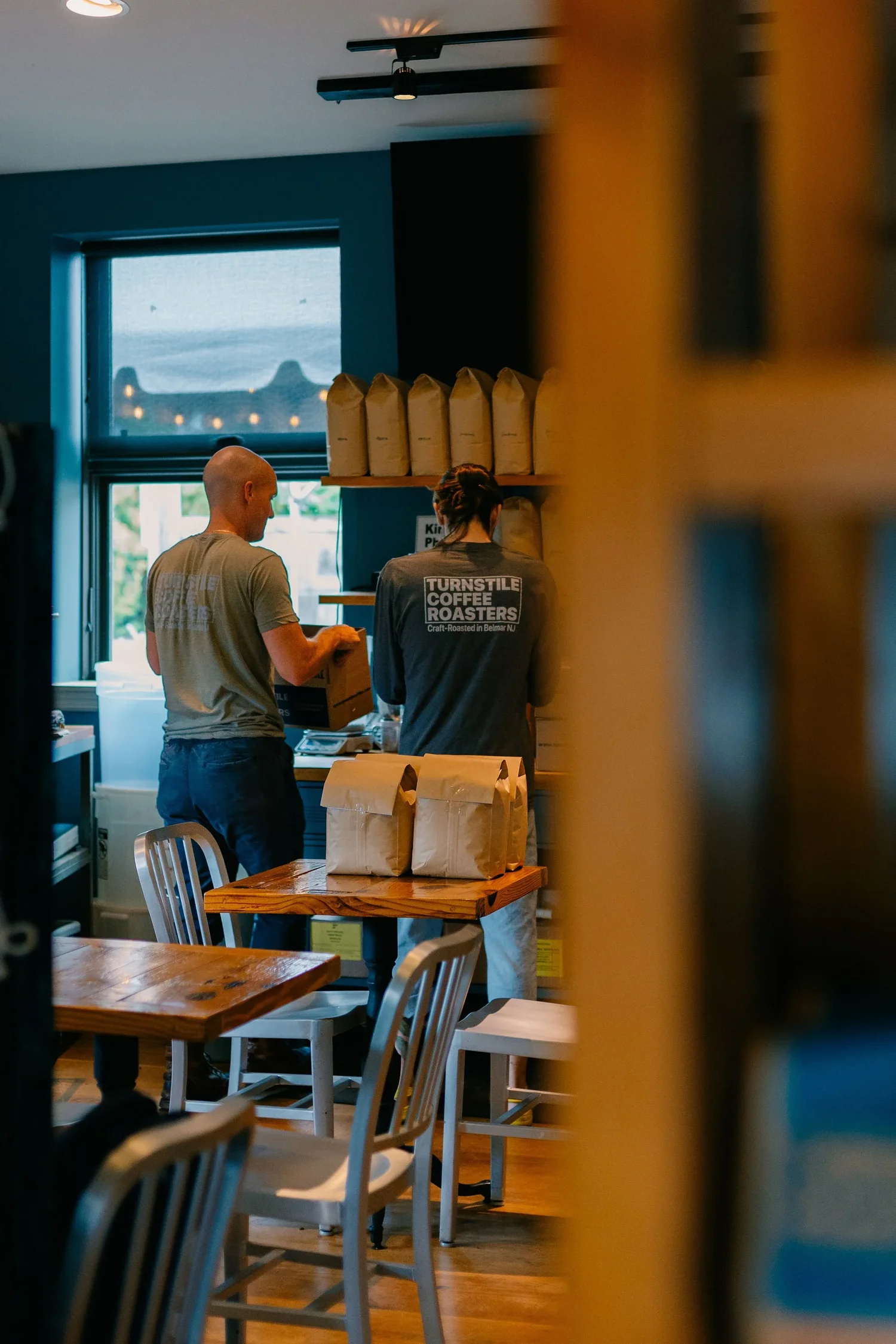 Turnstile staff packaging fresh-roasted wholesale orders