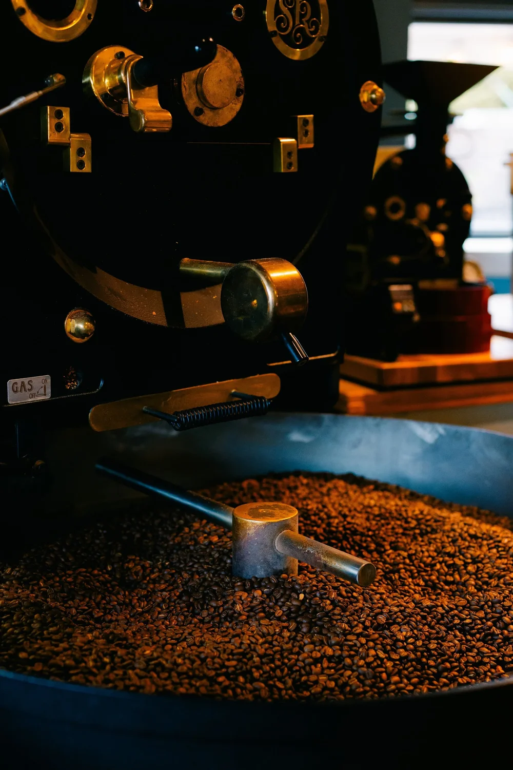 The brass and copper San Franciscan roaster cooling a fresh batch of beans at Turnstile