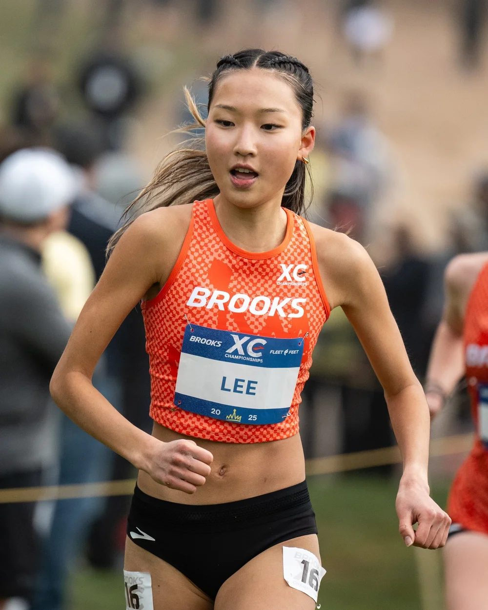 Racer in a Brooks XC singlet