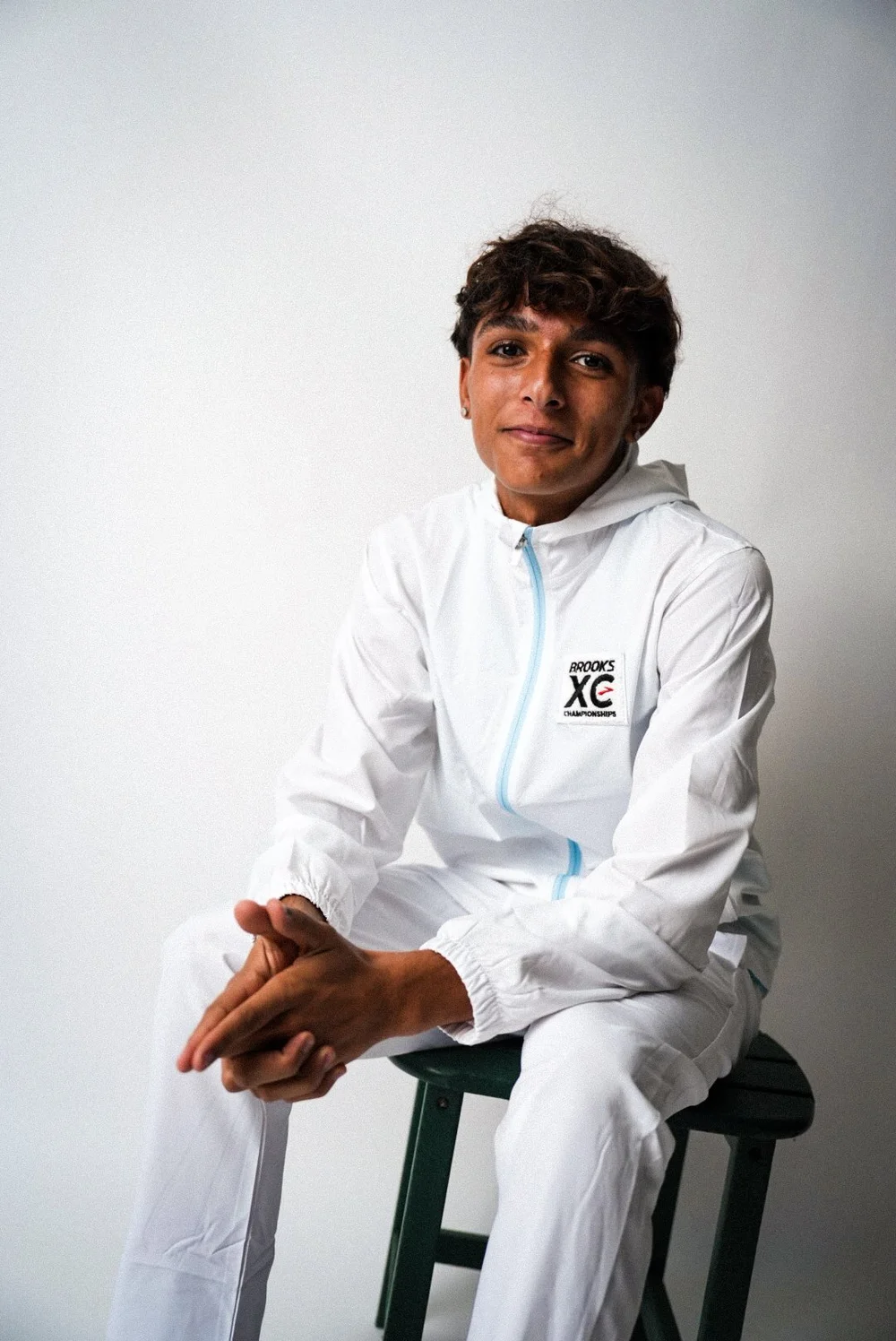 Athlete in a Brooks XC warm-up