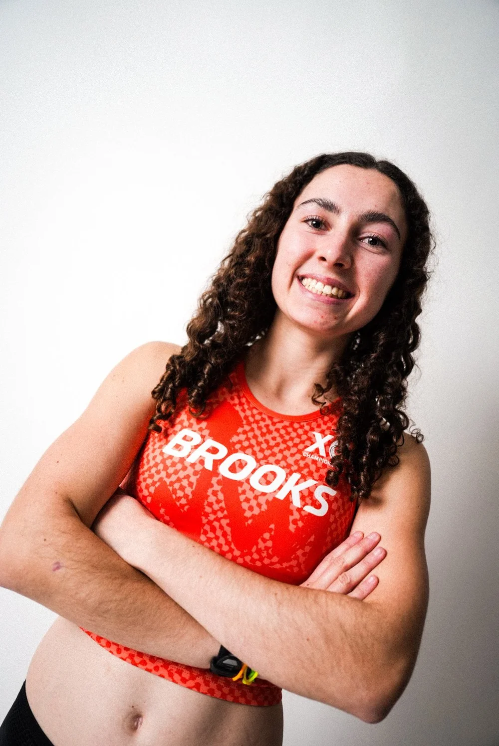 Athlete in a Brooks XC singlet