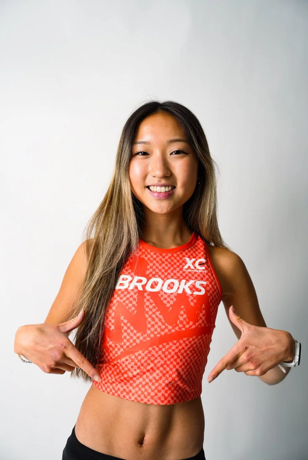 Athlete in a Brooks XC singlet