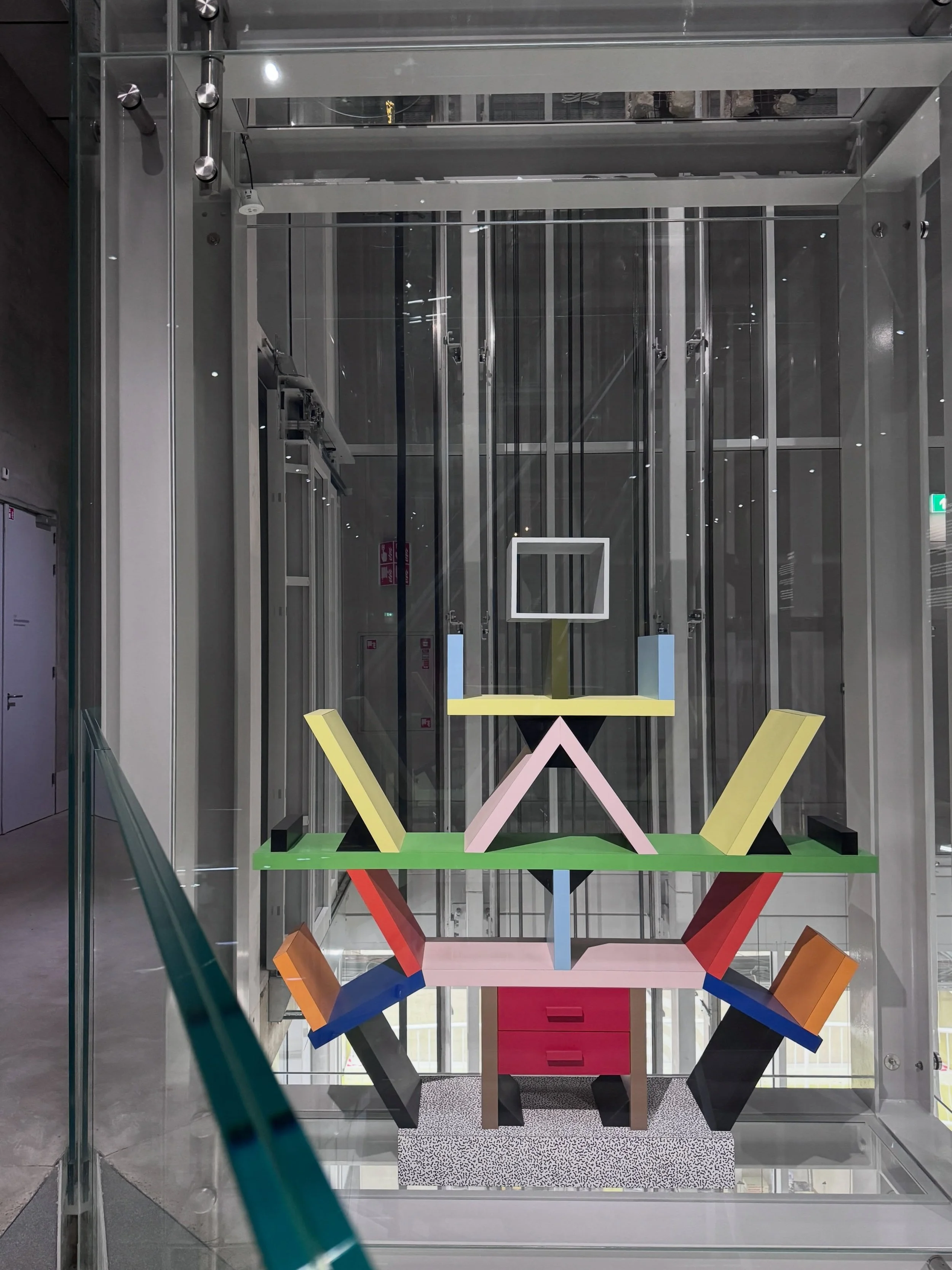 Colorful chairs displayed inside an art-storage bay at Depot Boijmans Van Beuningen.