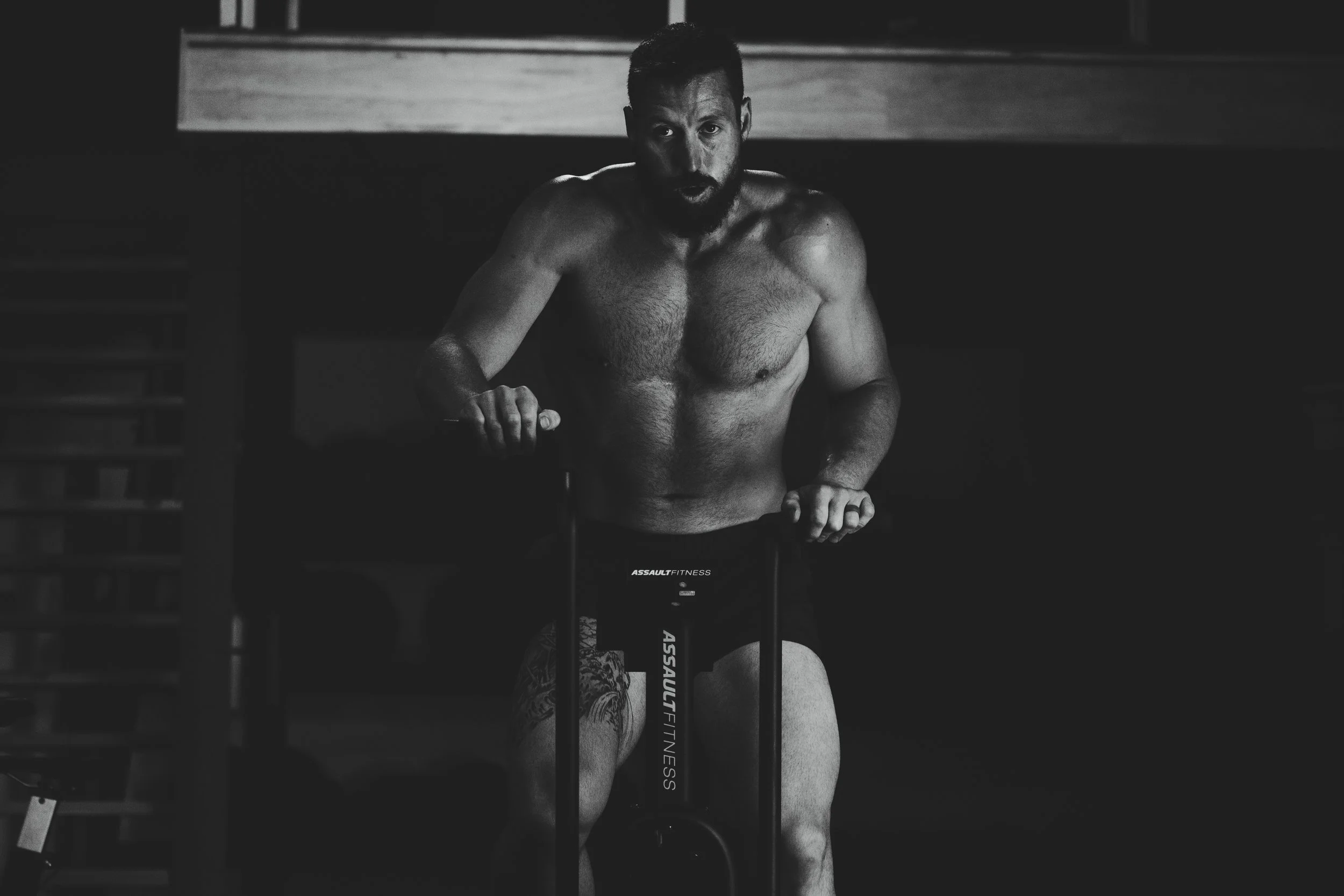 Athlete working on the assault bike