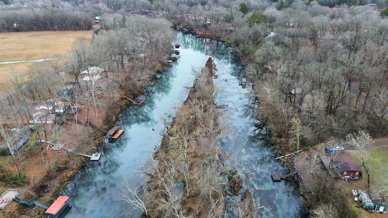 Aerial drone view of the Little Red River channel and tree canopy