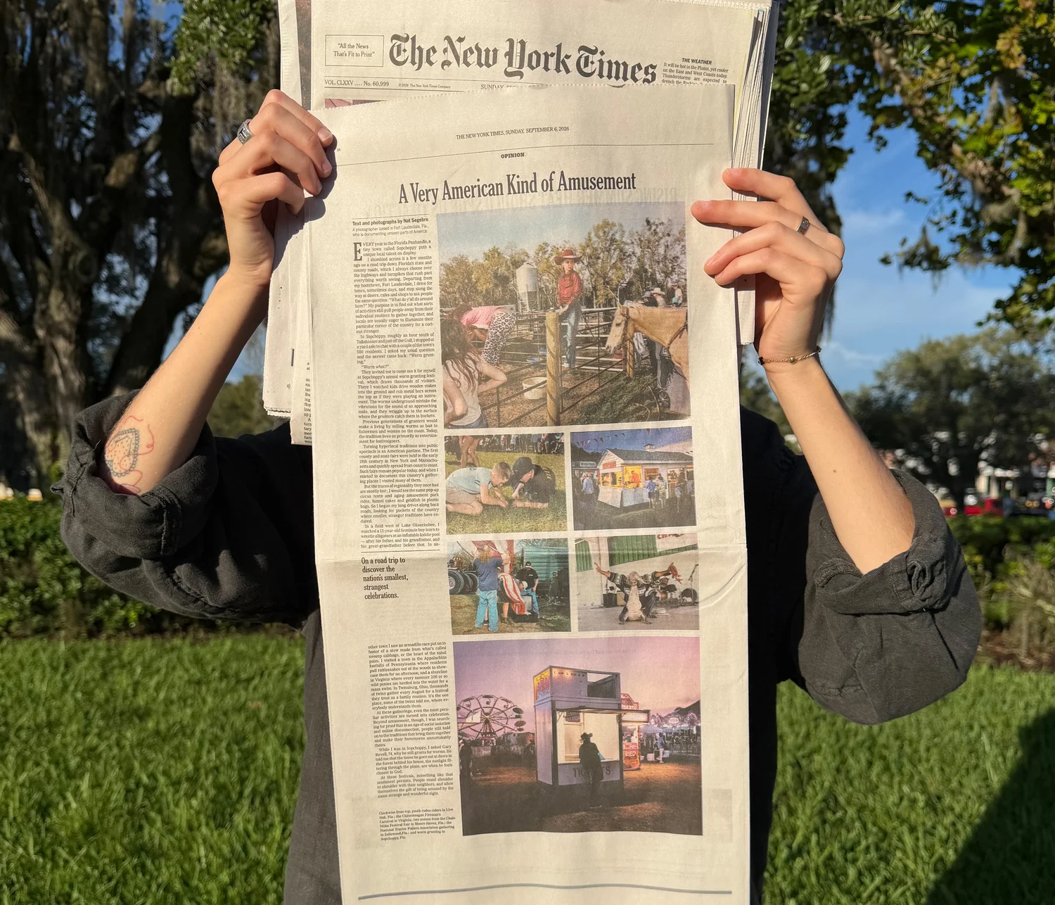 The full back page of The New York Times Sunday Opinion section, held open