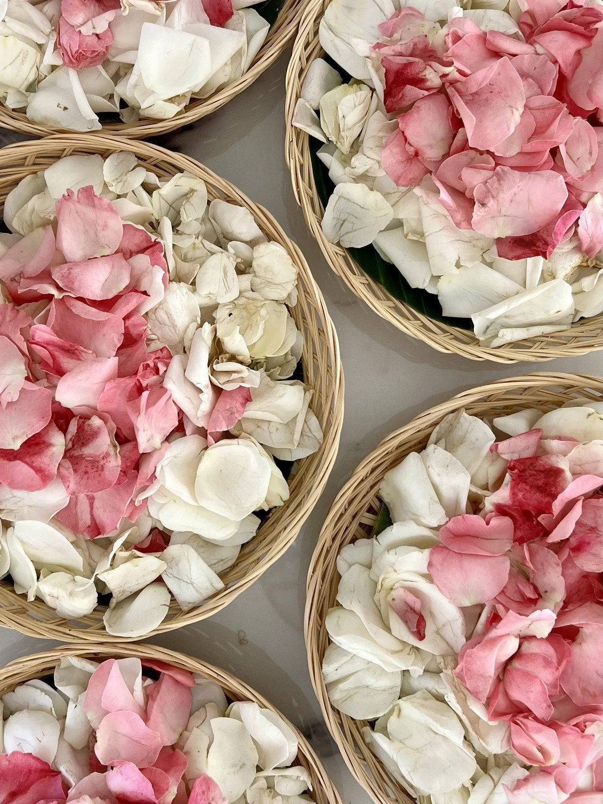 Baskets of pink and white petals