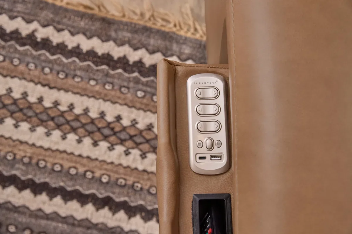 Close-up of the Ranger power control buttons on the side, in Oakridge leather