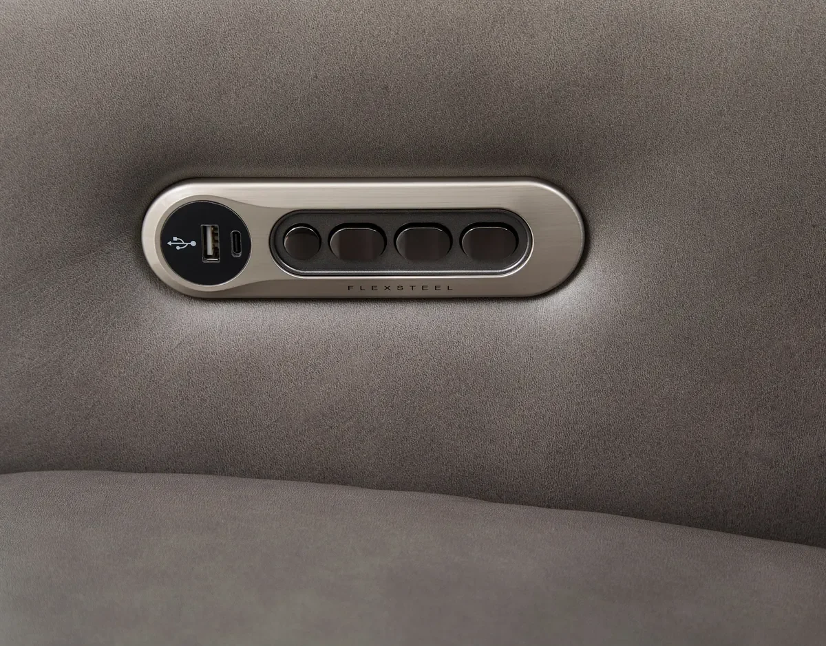 Close-up of the Wyatt power control with USB ports in Black/Gray leather