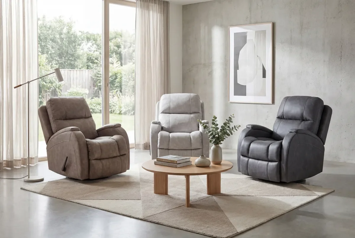 Model 214 recliners in Taupe, Pebble and Graphite around a round wooden coffee table in a modern living room