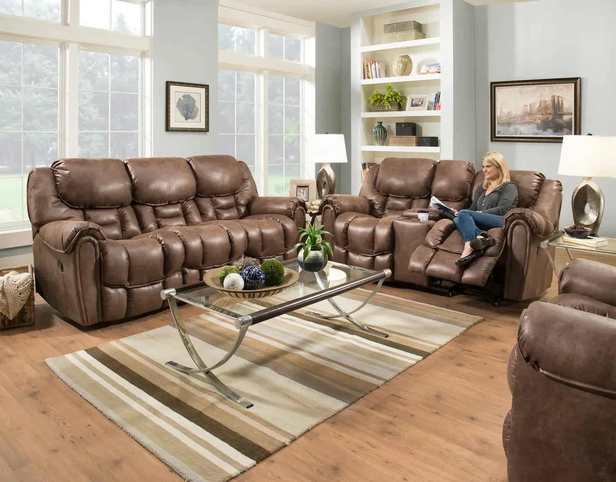 Model 122 reclining sofa group in Mocha in a living room