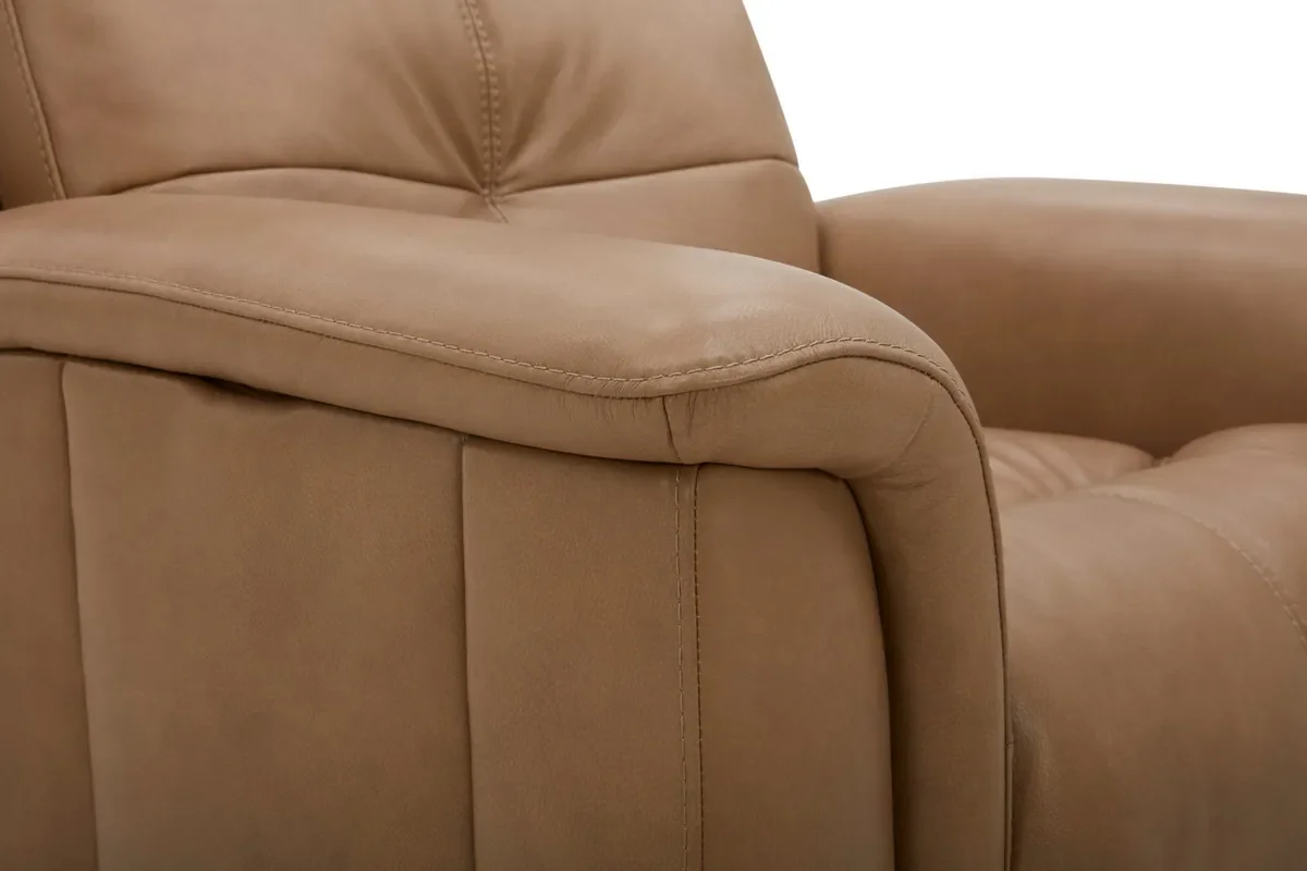 Close-up of the arm and pull-tufted back of the Ranger recliner in Oakridge leather