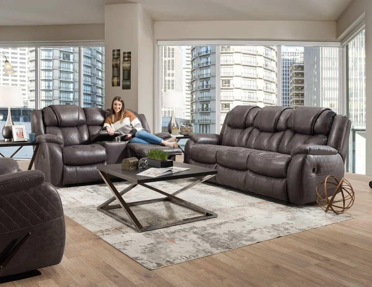 Model 182 reclining sofa group in Steel in a living room
