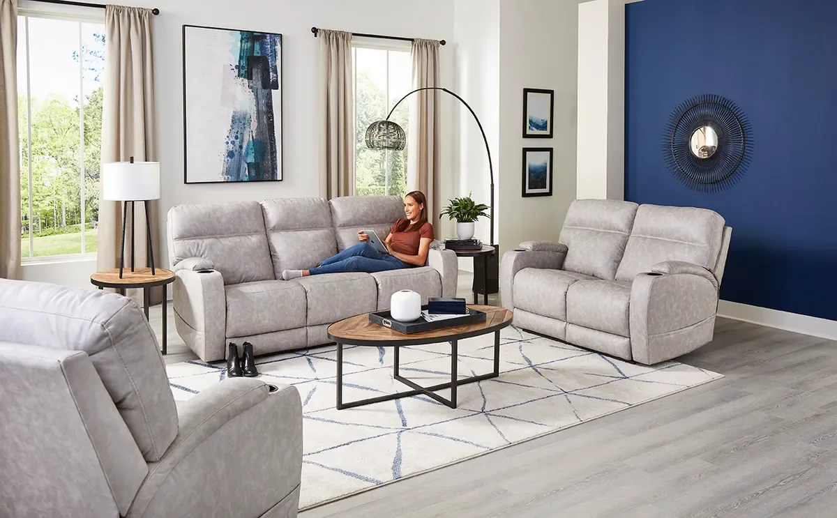Model 200 power reclining sofa in Pebble in a living room
