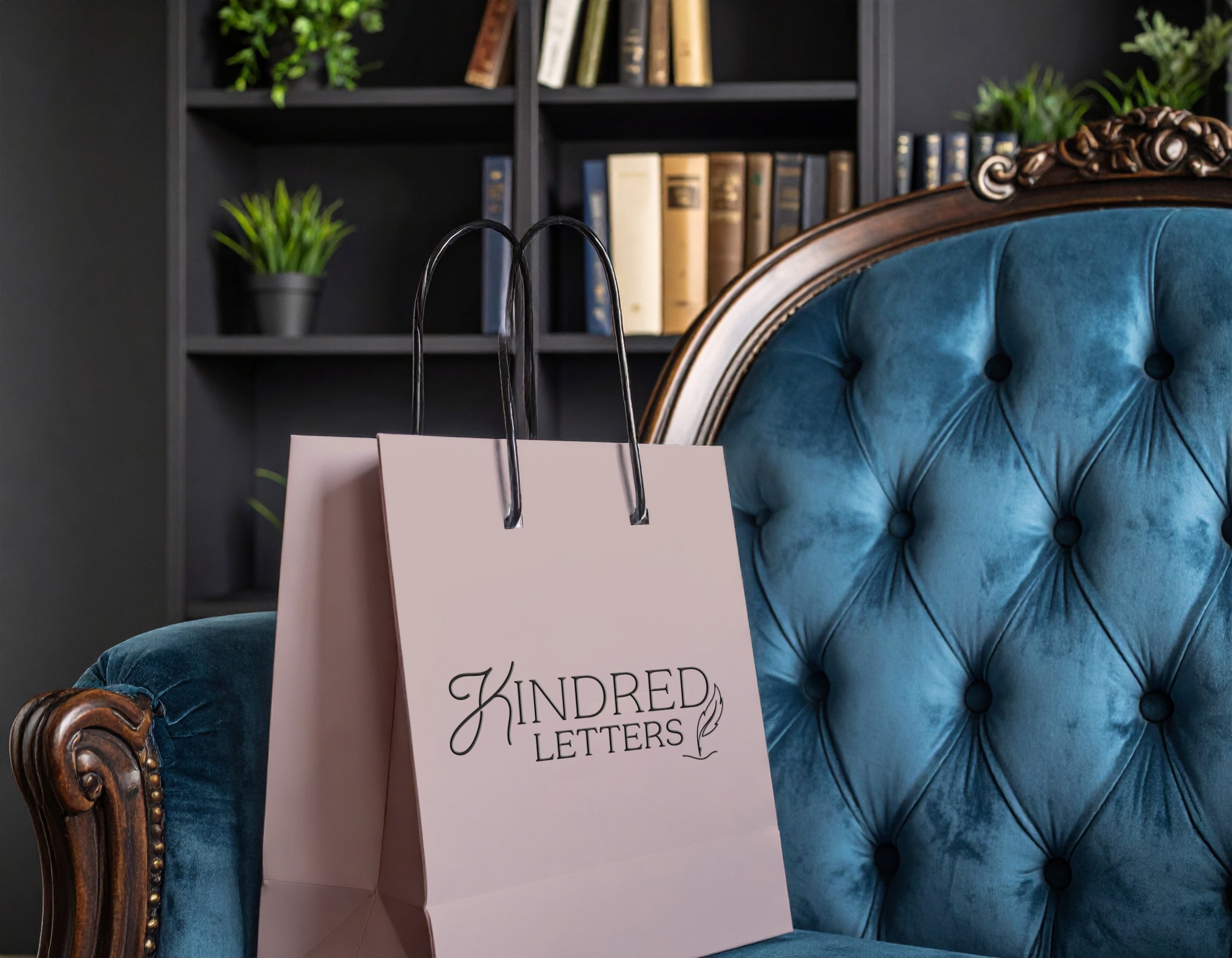 Kindred Letters is a fictional passion project Book Store brand design mockup of a shopping bag with the full logo design, made by Brandelle Designs.
