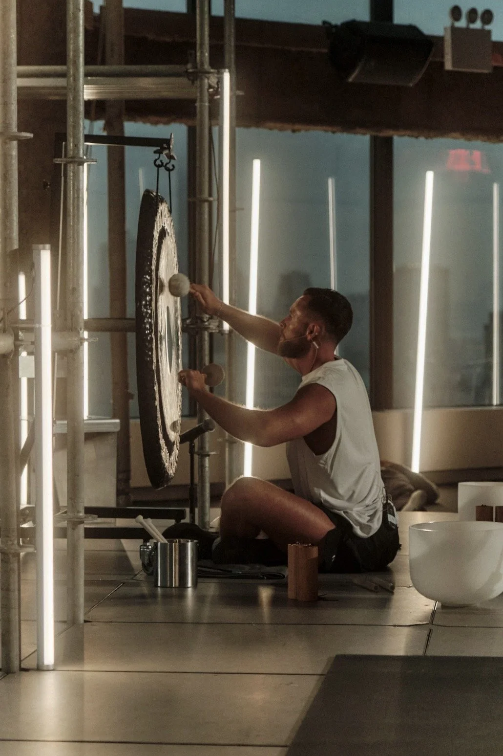 Tom beside the gong at the On New York event