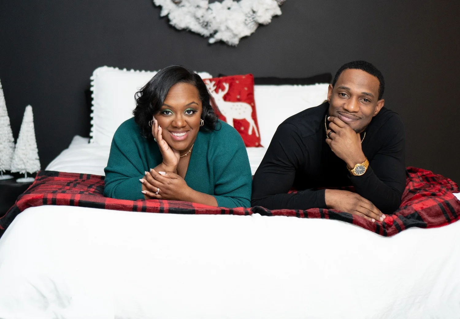 Couple relaxing on a Christmas bed