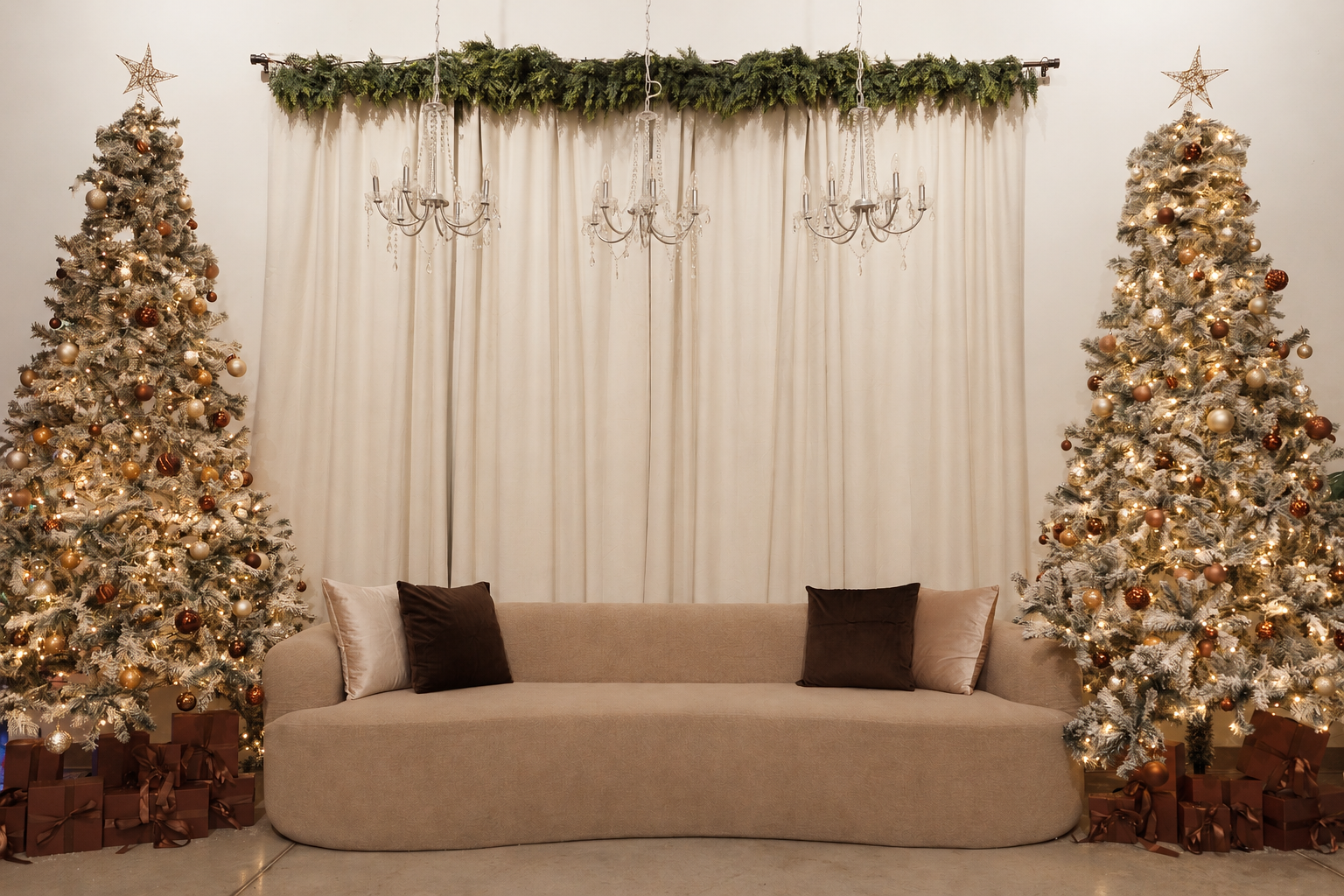 Arlington Christmas studio with champagne sofa, chandeliers and two illuminated trees