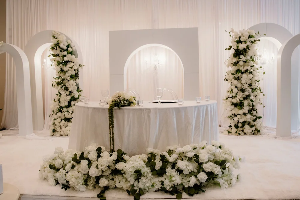 Floral arches over the reception