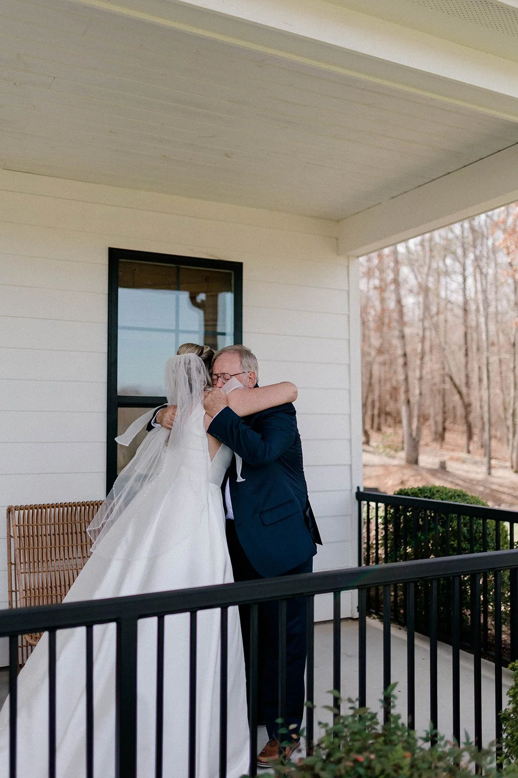 A couple on the porch in the last light