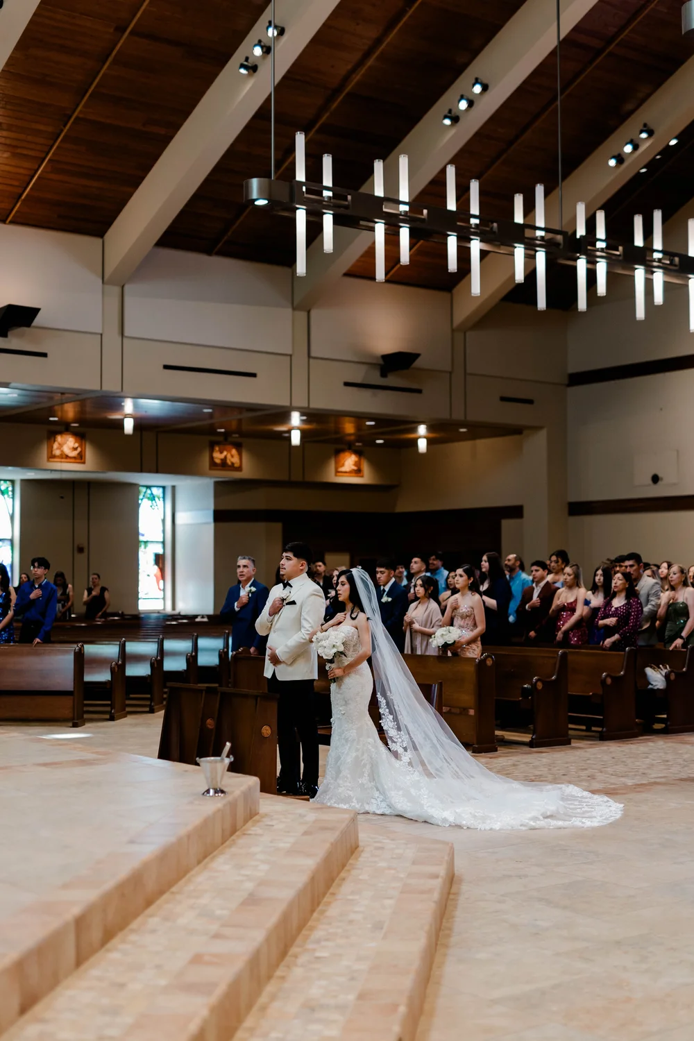 Couple at the altar during a Catholic ceremony