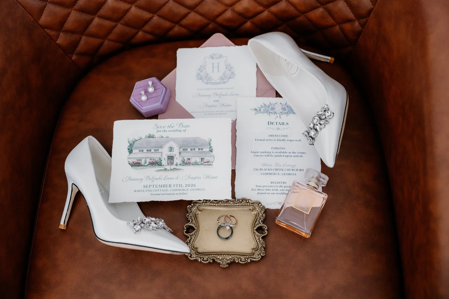 The invitation suite laid out with the shoes